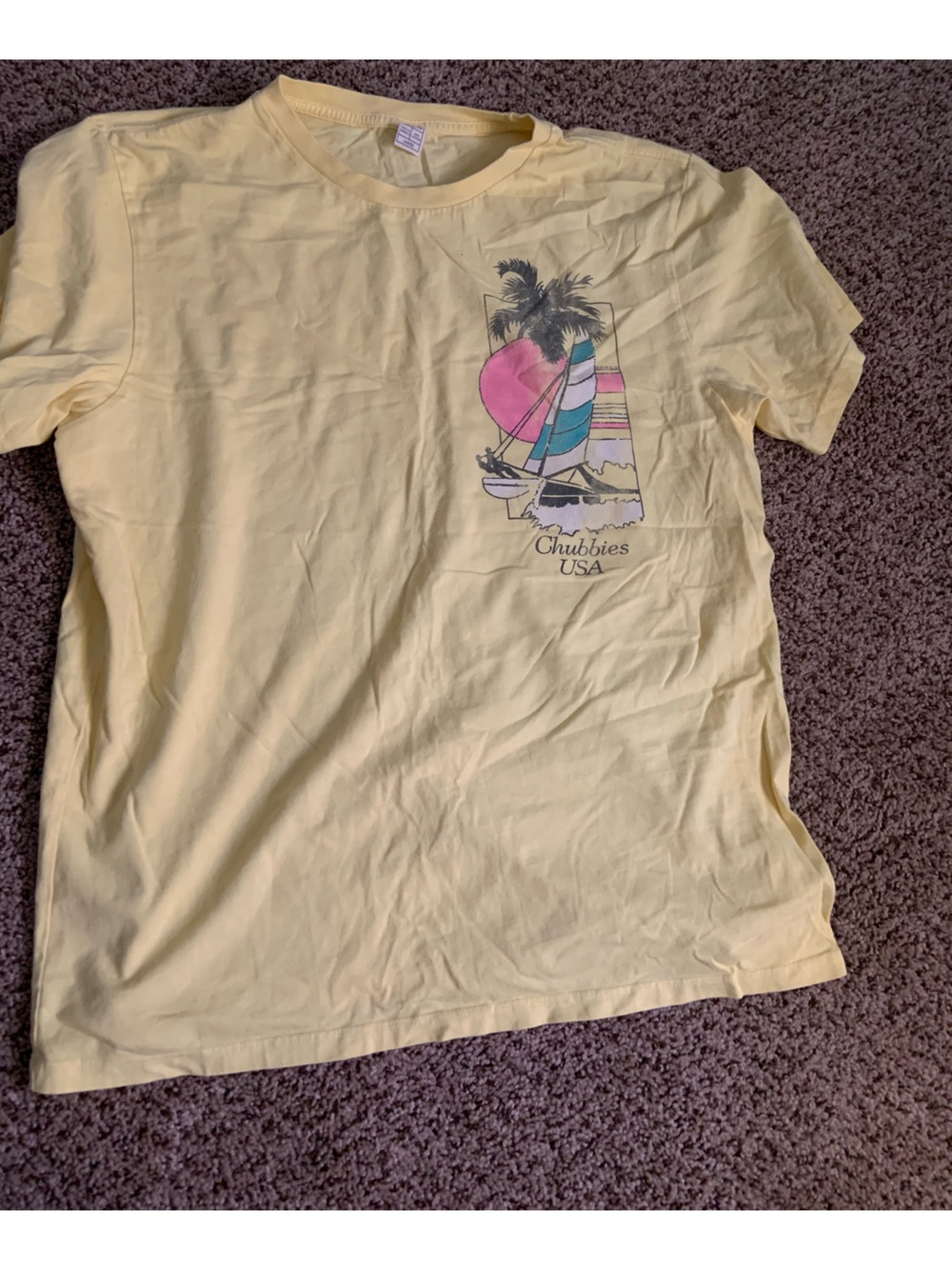 Chubbies Men’s Pale Yellow Tee with Pink and Teal Sailboat Graphic